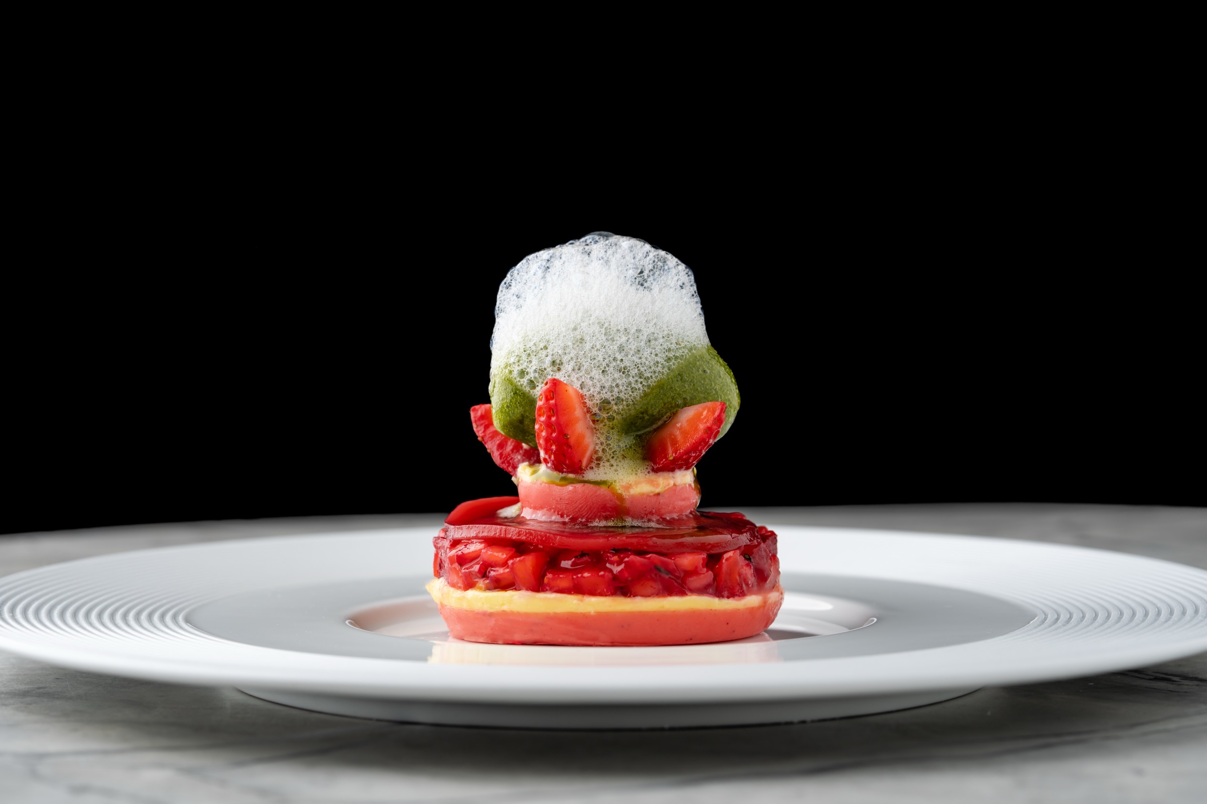 Chef plating in Restaurant Lucie kitchen